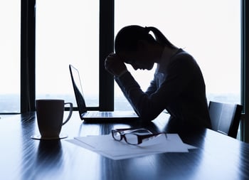 Woman Stressed with Laptop